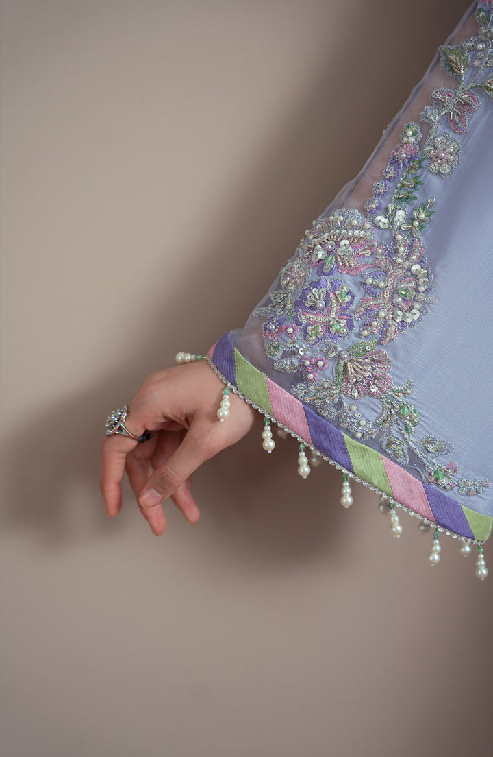 Sleeve design of IRIS Shirt worn by model – Pret Collection Elvin